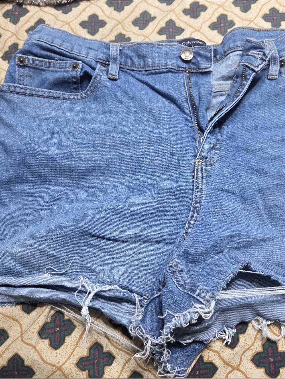 Calvin Klein Light Blue Distressed Denim Cutoff Shorts